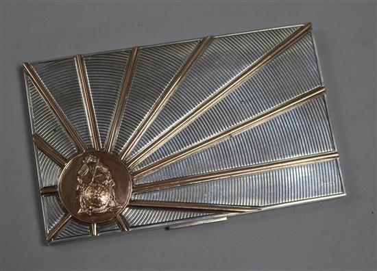 A white metal and gilt engine-turned cigarette case, with sunburst motif bearing the seal of Maharajah Hari Singh (1895-1961)